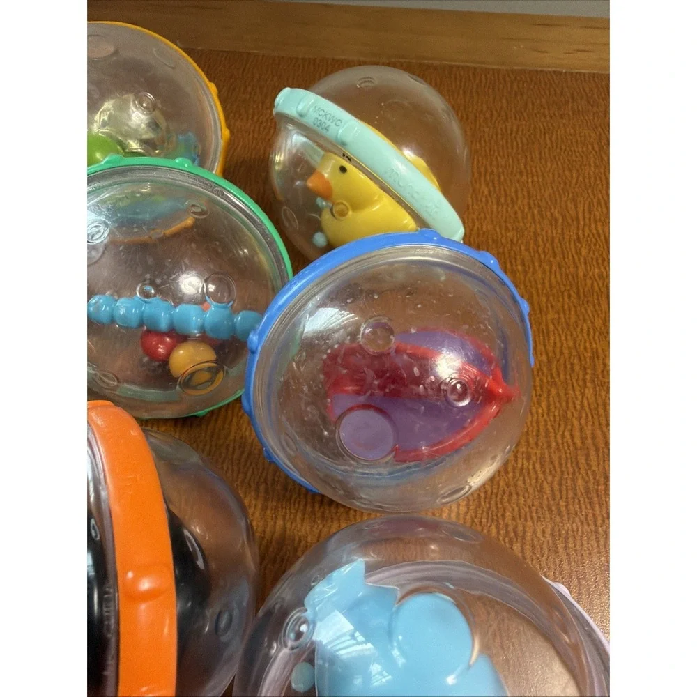 Munchkin Balls Rattles Turtle Penguin Spinner Toys Lot of 9 Baby Bath & Sensory